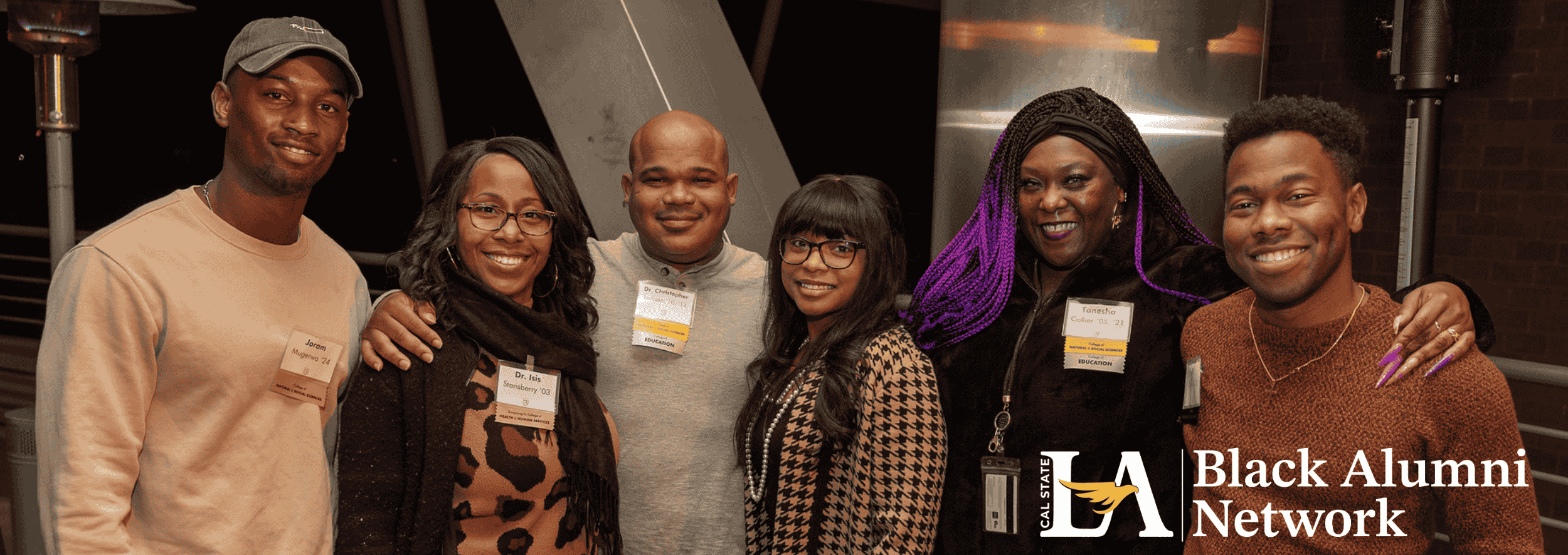 Six people posing and smiling for the camera. Overlaid text reads Cal State LA Black Alumni Network