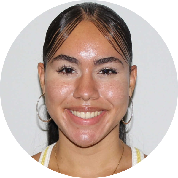 Woman smiling with white background.