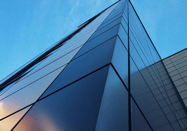 High rise building with a blue sky background