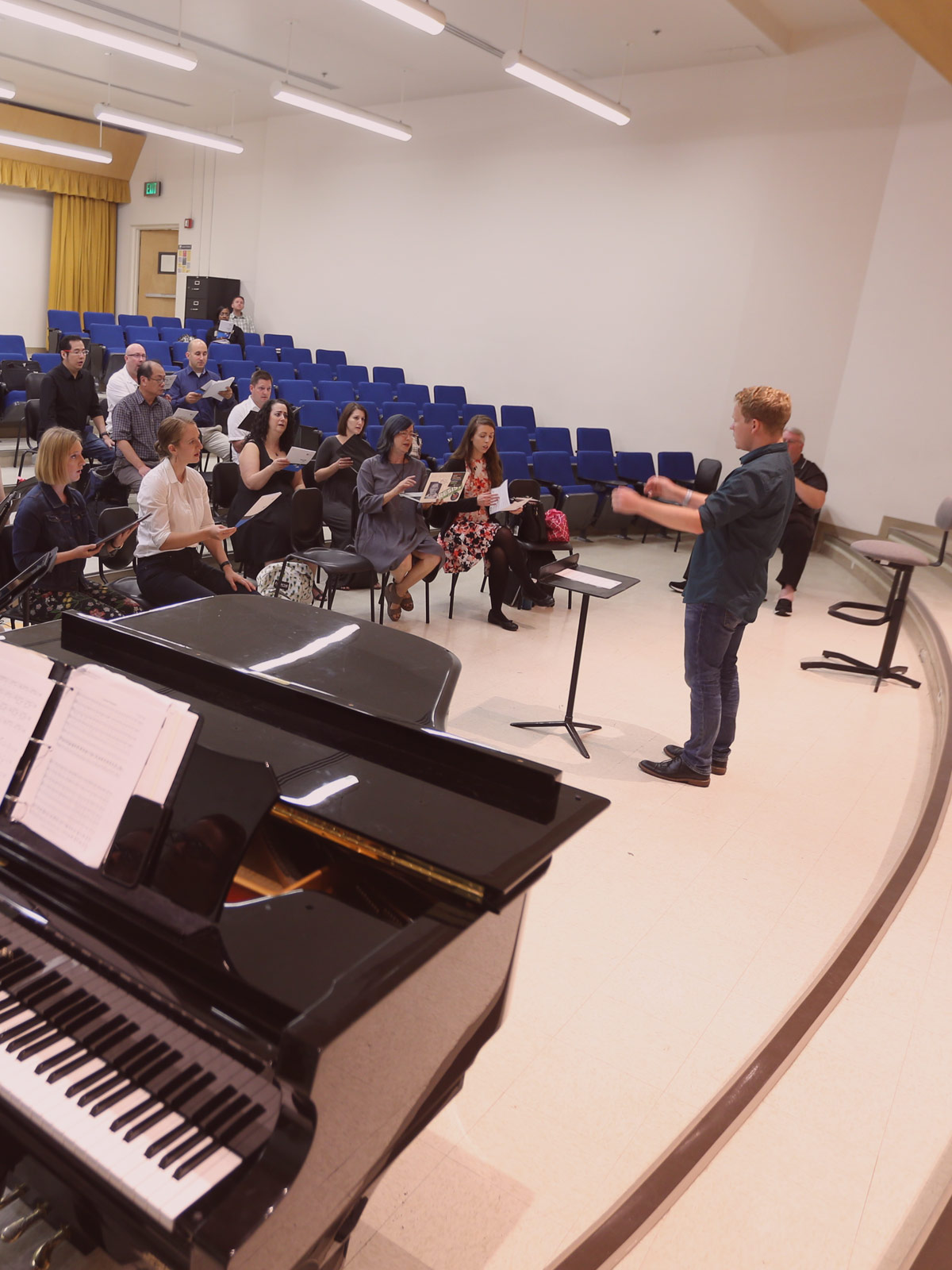 A music teacher lecturing to their class.