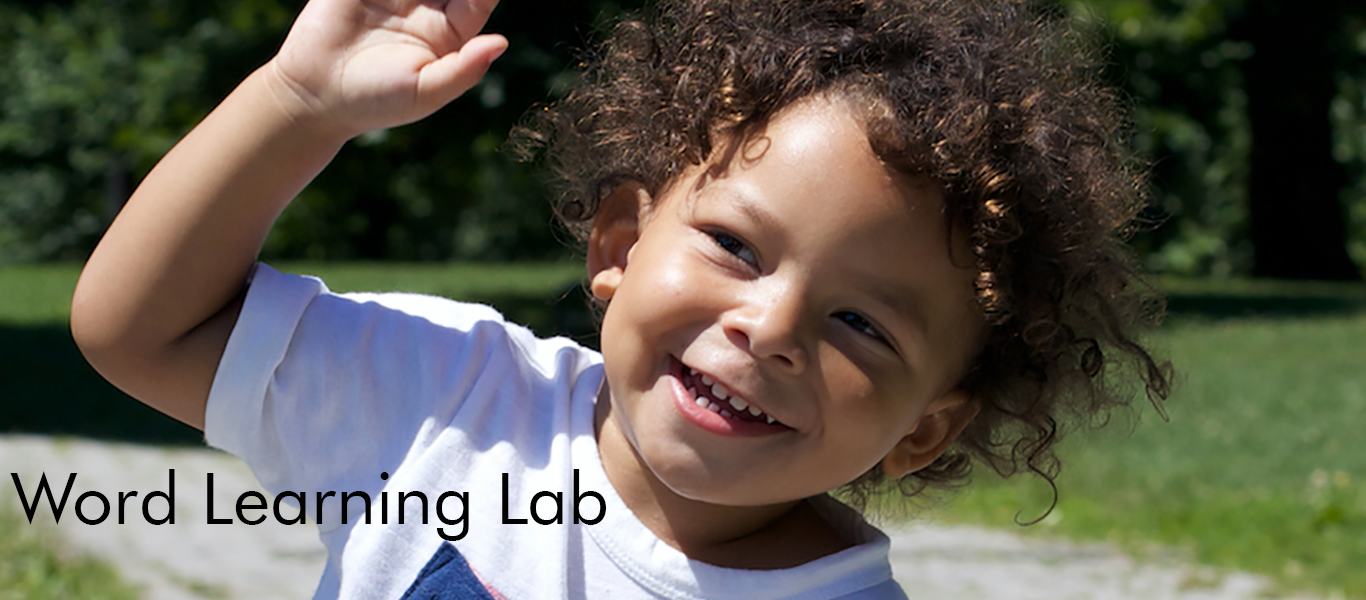 Child smiling playing outside. 