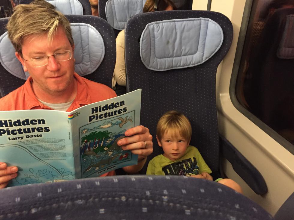 Photograph of Chris Endy reading a book.