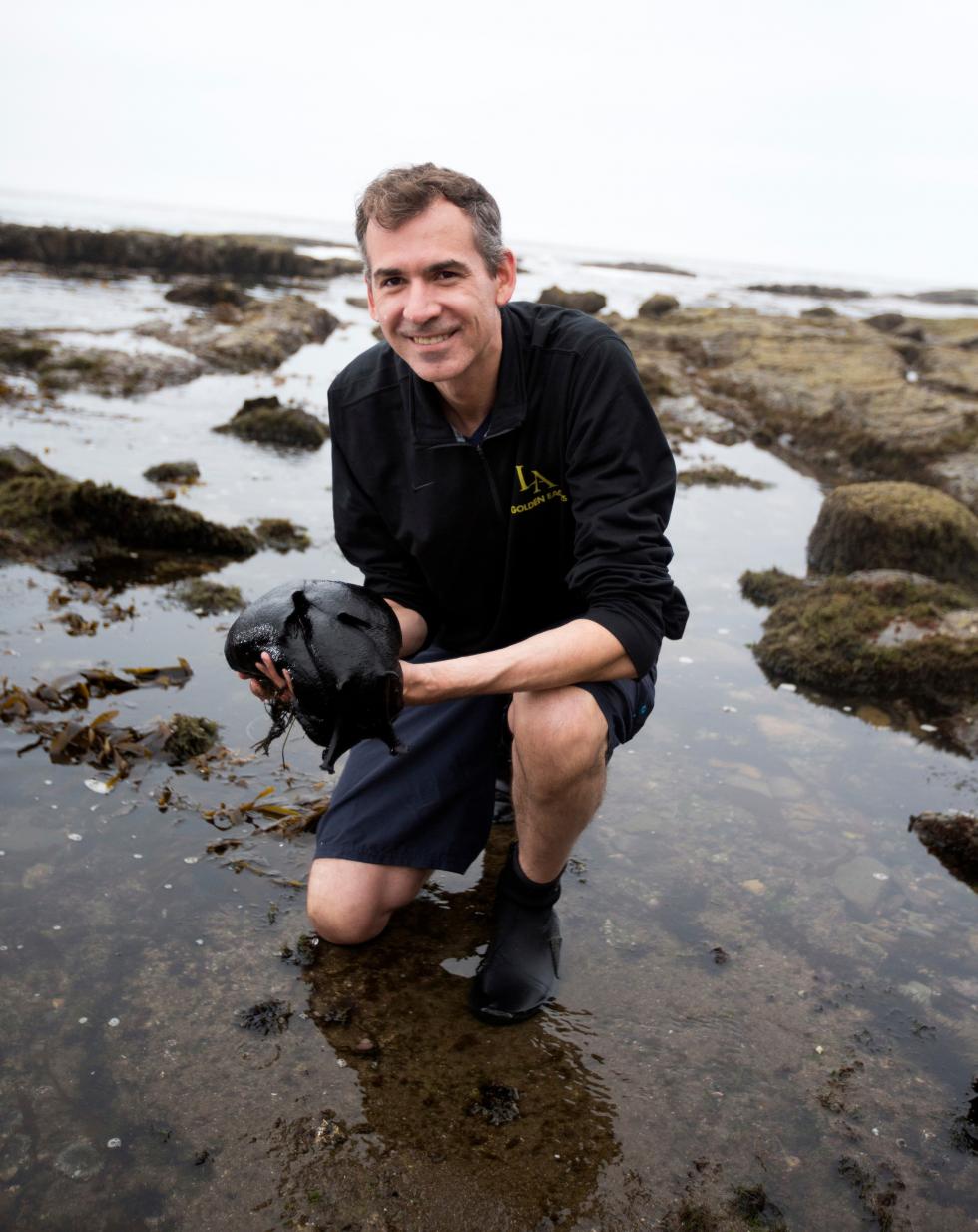 Ms. Patrick Krug holding a sea slug