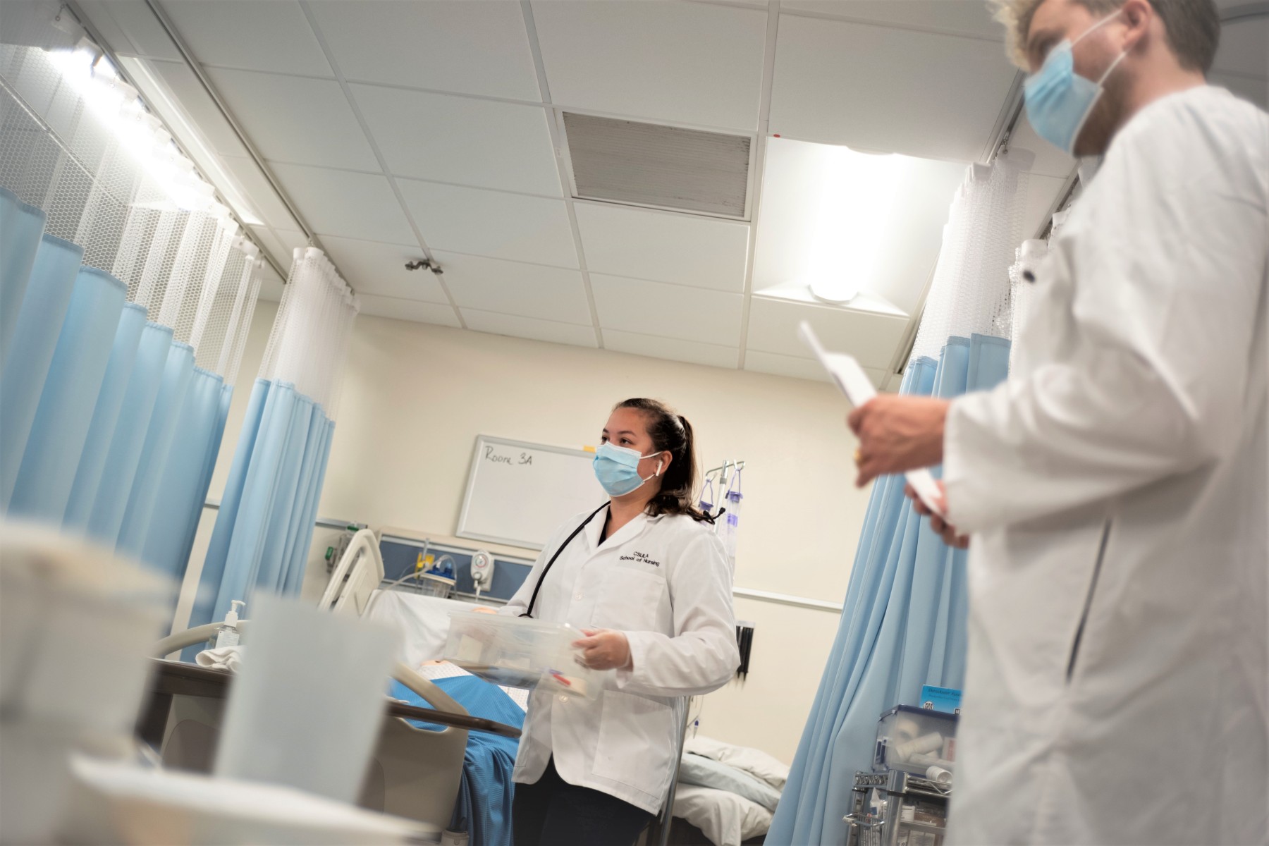 Students working in nursing lab