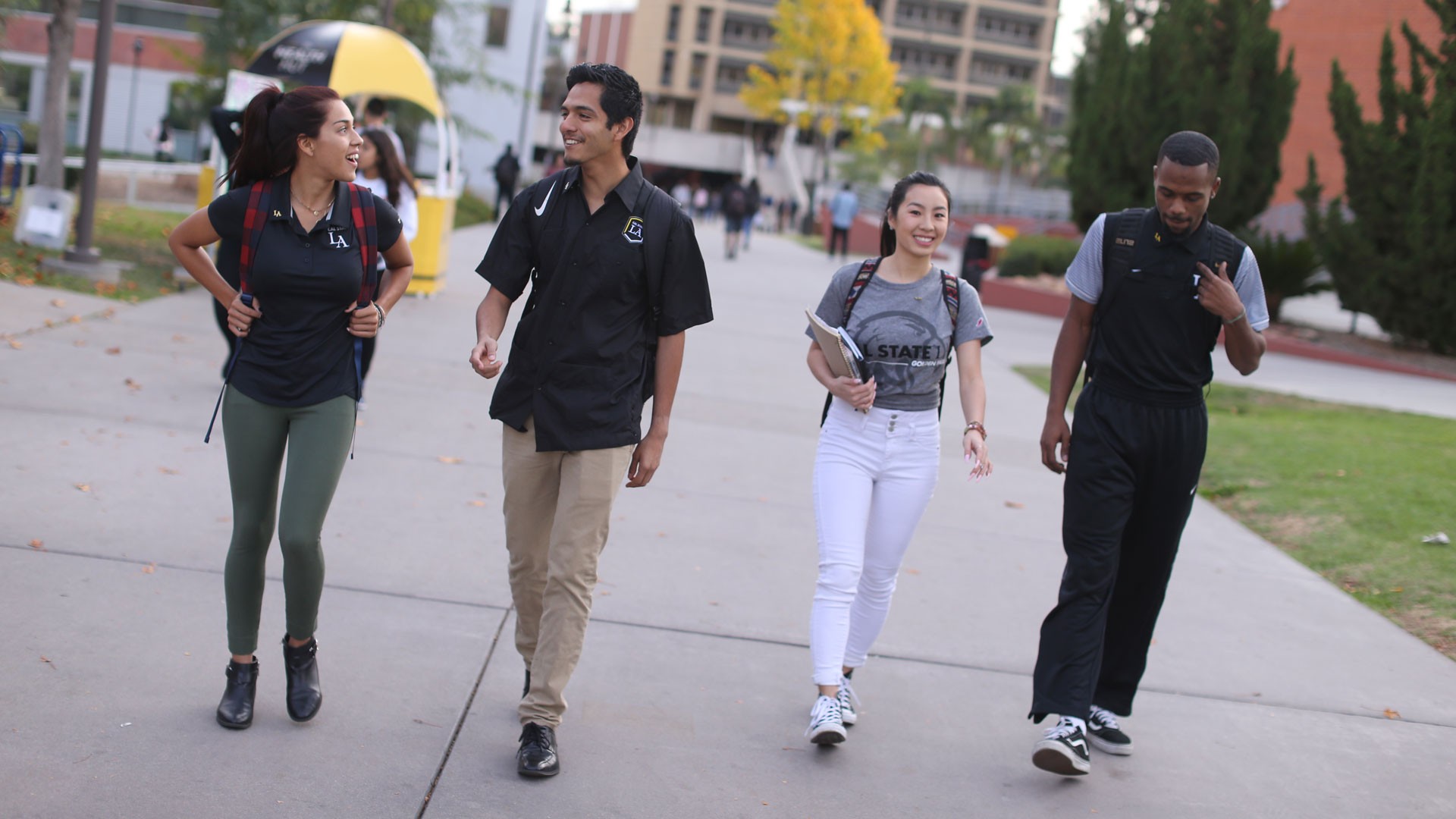 Students walking on a sunny day.