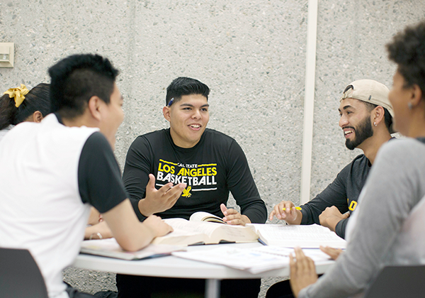 Students meeting in their peer group