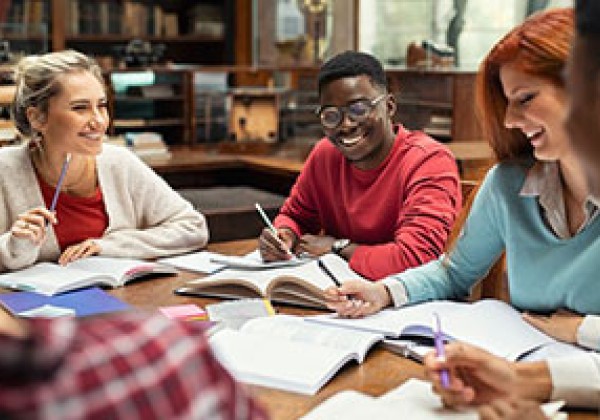 students meeting at table