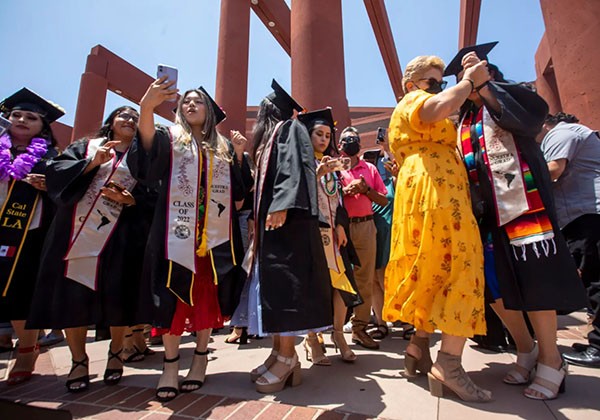 Student in graduation attire. 