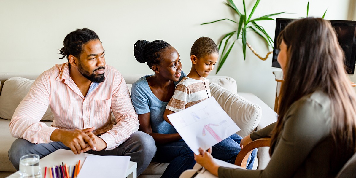 A family meeting with a therapist or social worker.