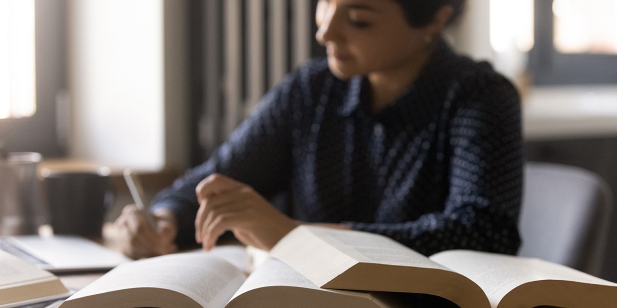 Female student doing research.