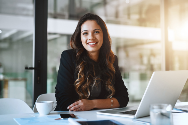 Women at desk in office.