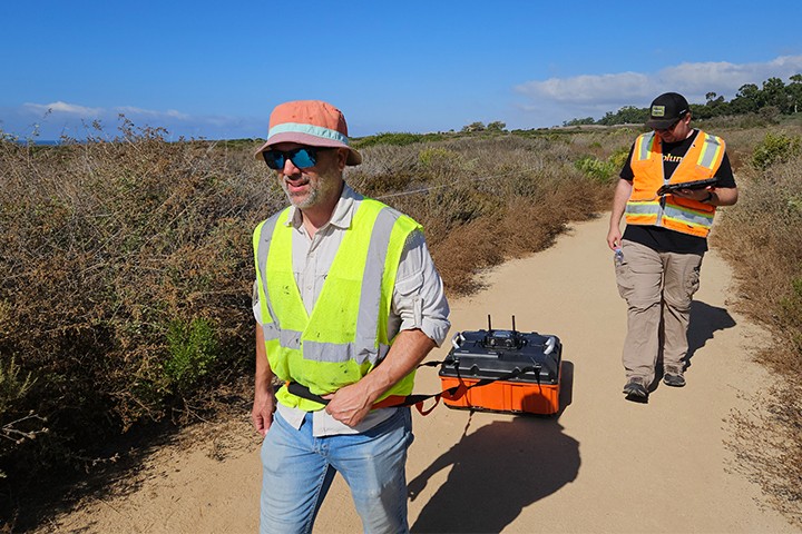 Faculty and student out in the field