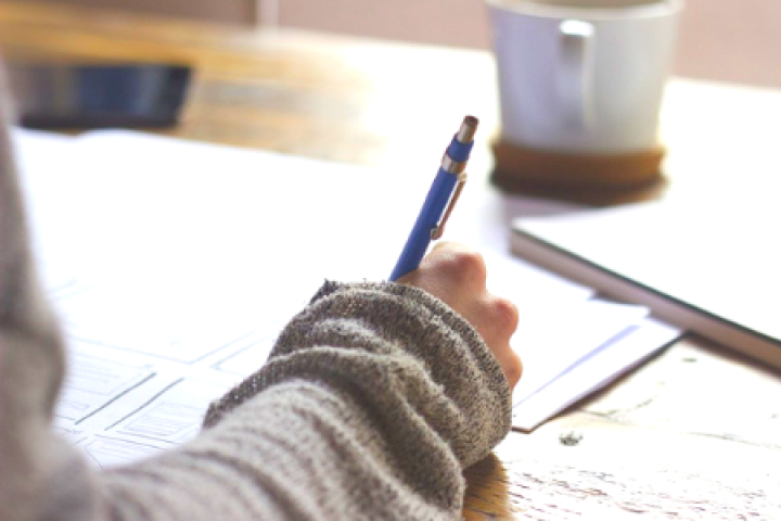 Close up of someone writing