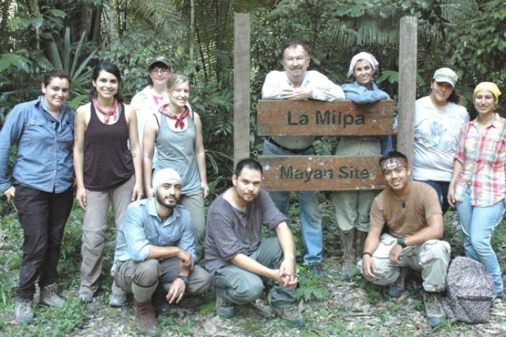 James Brady with students in the field