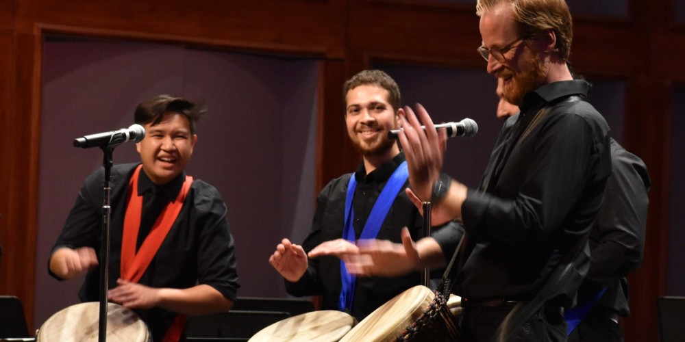 Dr. Adam Snow leading the Percussion Ensemble