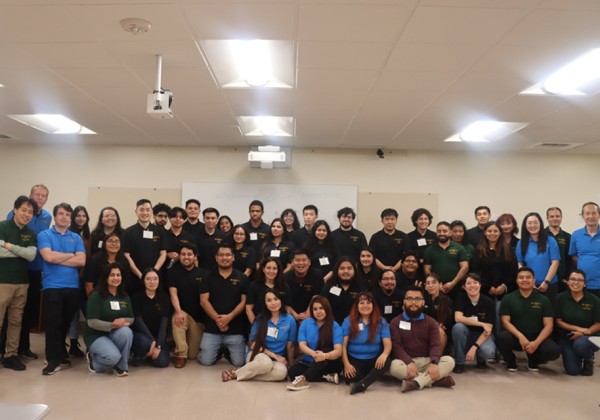 A large group of accounting students taking a group photo.