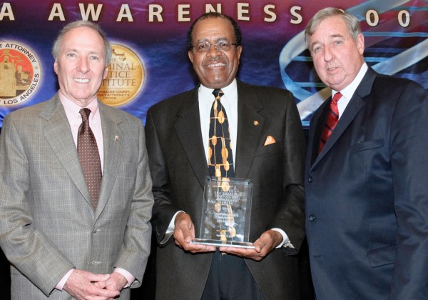 Author Joseph Wambaugh, left, and former LA District Attorney Steve Cooley, right, joined former Cal State President James Rosser at the Golden Eagle Ballroom in 2009.