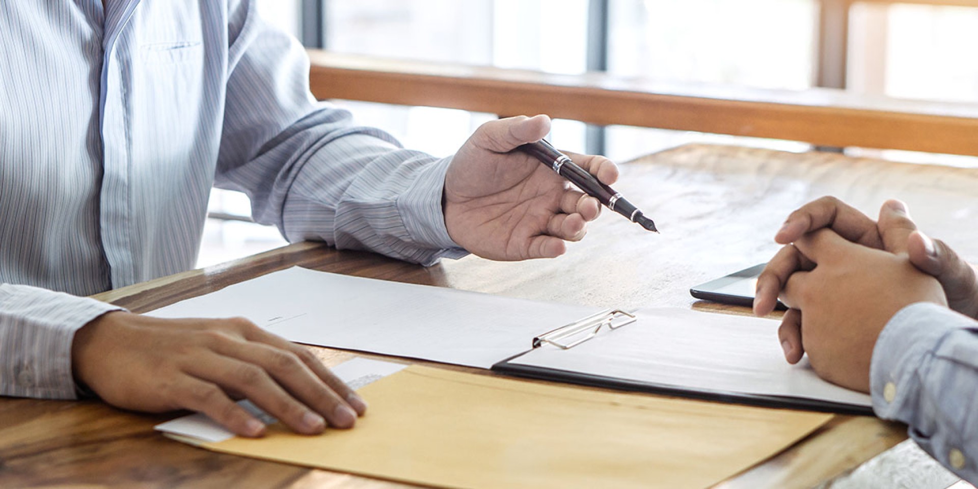 people filling out paperwork