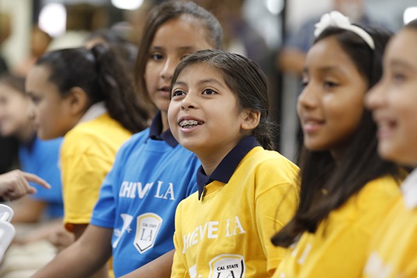 Children in Achieve LA shirts