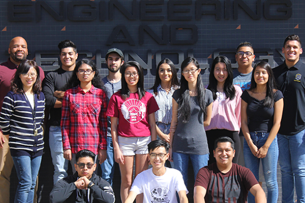 CAPS student cohort with faculty at ET building