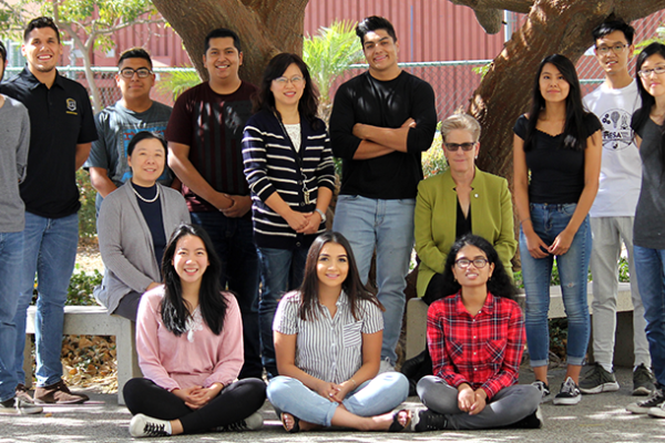 CAPS student cohort with faculty staff and students